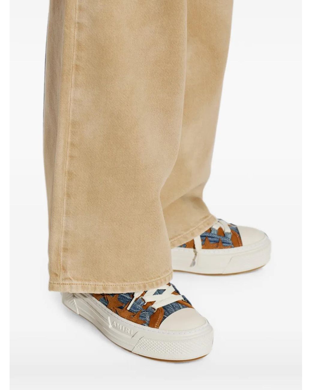 Sneakers Con Stelle Patchwork di Amiri in White