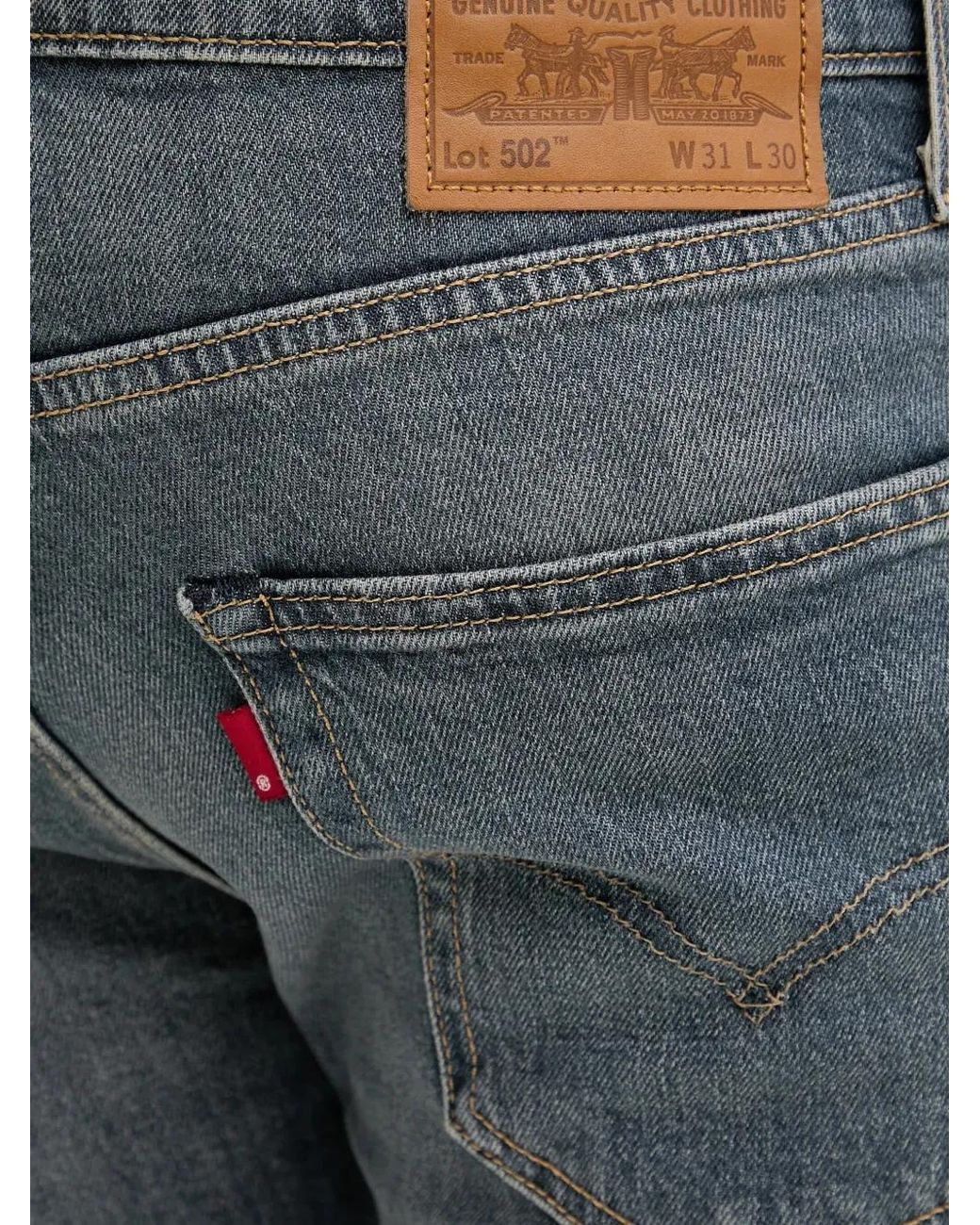 Levi's Blue 502 Button Tapered Jeans for men
