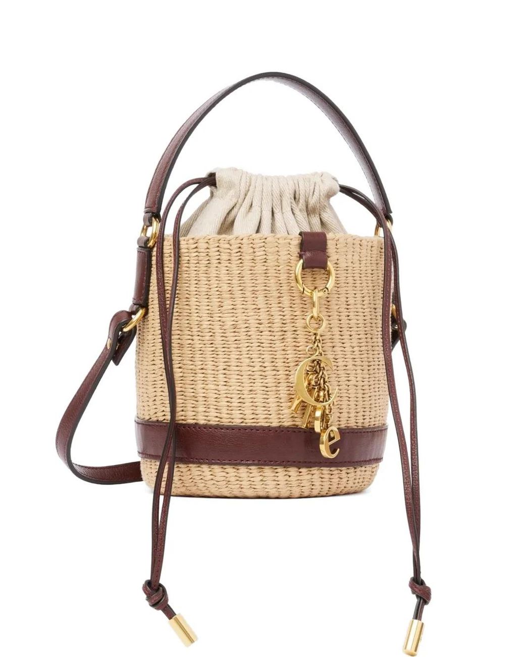 Chloé Woven Drawstring Cross Body Bag in Natural | Lyst