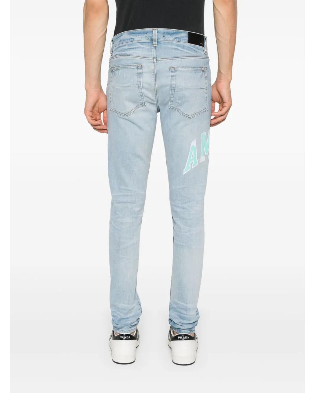 Amiri Blue Varsity Logo Skinny Jeans for men