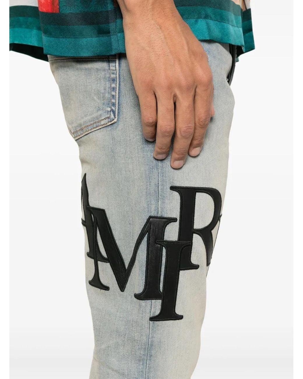 Amiri Blue Skinny Jeans With Offset Logo for men