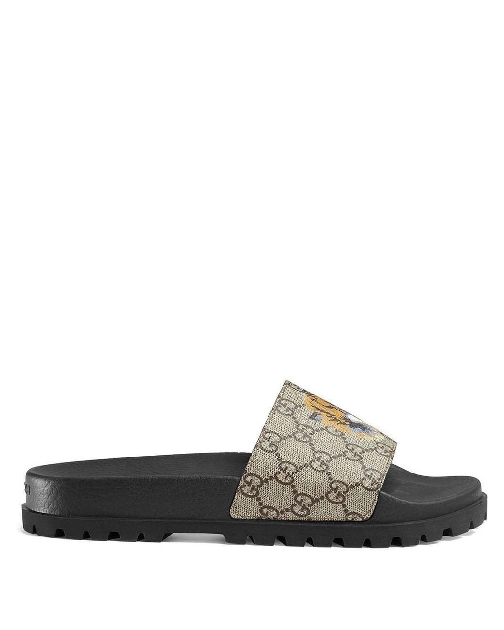 Gucci tiger hotsell slides womens