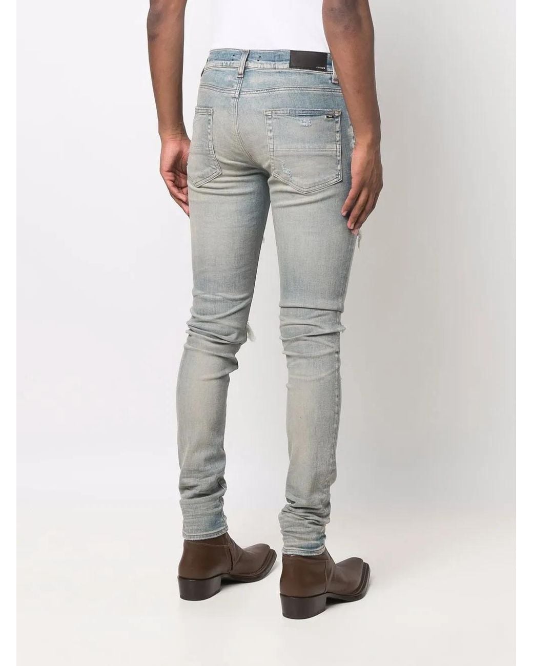 Amiri Blue Distressed Skinny Jeans for men