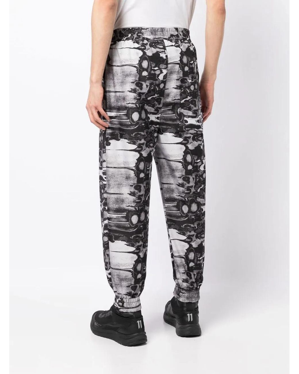 ISO.POETISM Black Khumbu Abstract-Print Track Pants for men