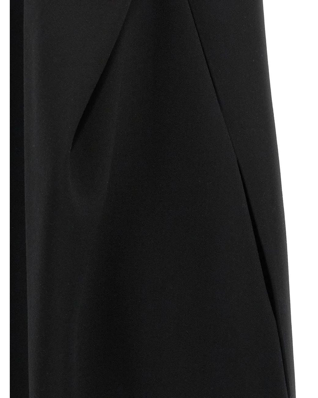 The Row Off-Shoulder Jurk in het Black