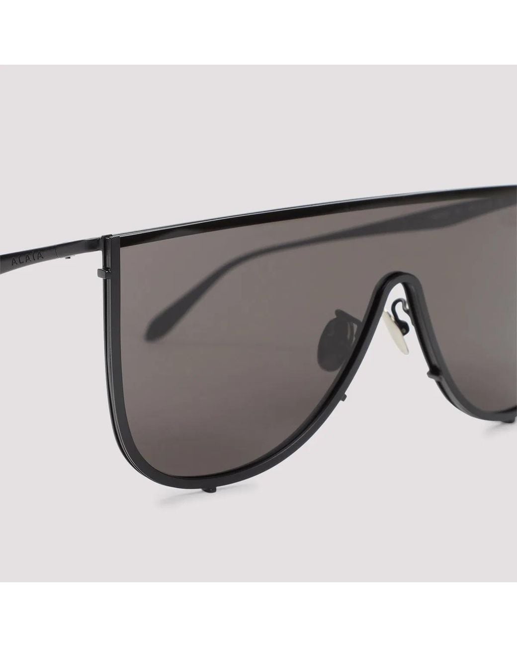 Alaïa Alaia Metal Frame Sunglasses in Black | Lyst UK