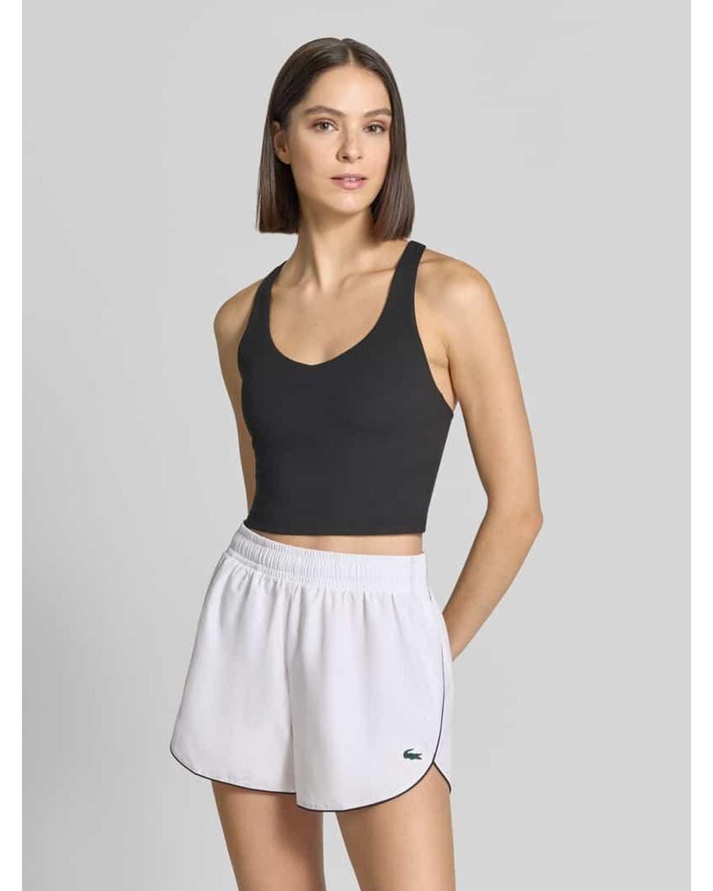 Fabletics Black Cropped Top mit integrierten Cups