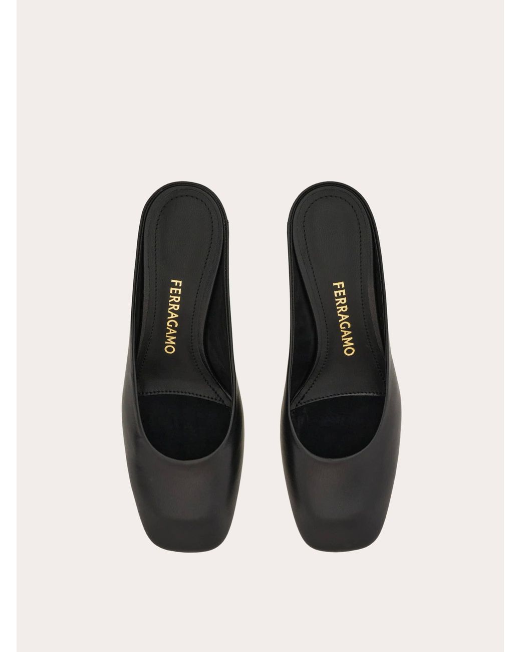 Ferragamo Black S-Shaped Heel Mule .5