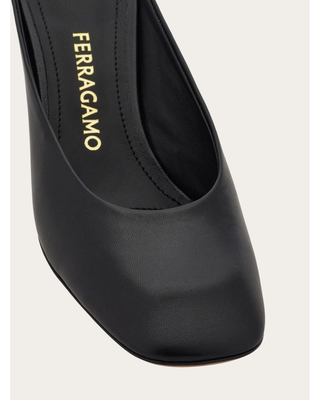 Ferragamo Black S-Shaped Heel Mule .5