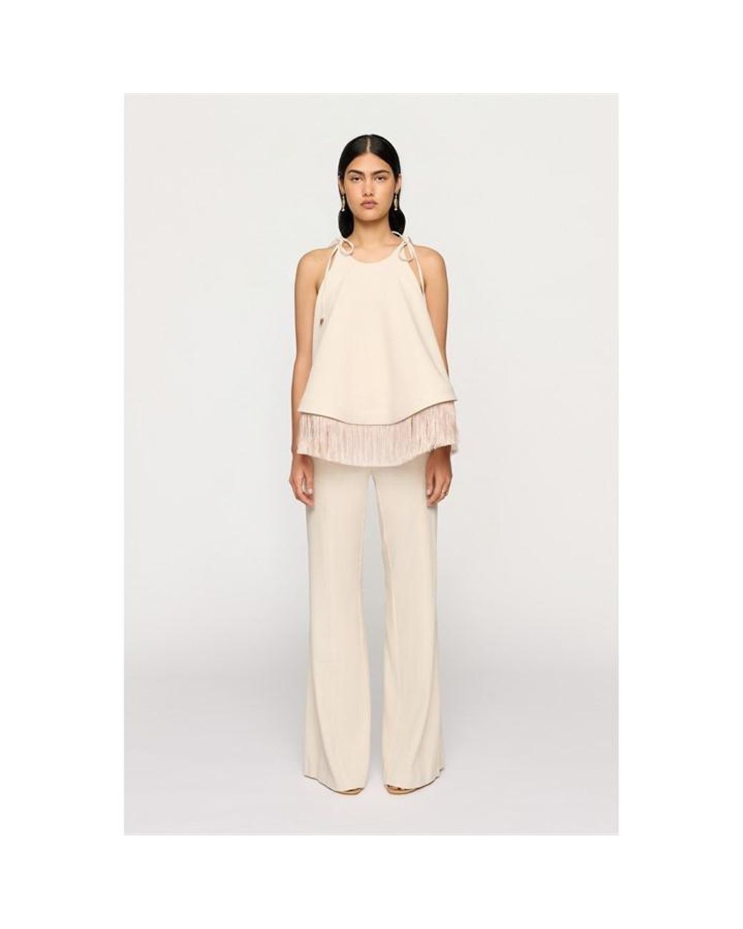 Clea White Bibi Fringe Dipped Hem Top