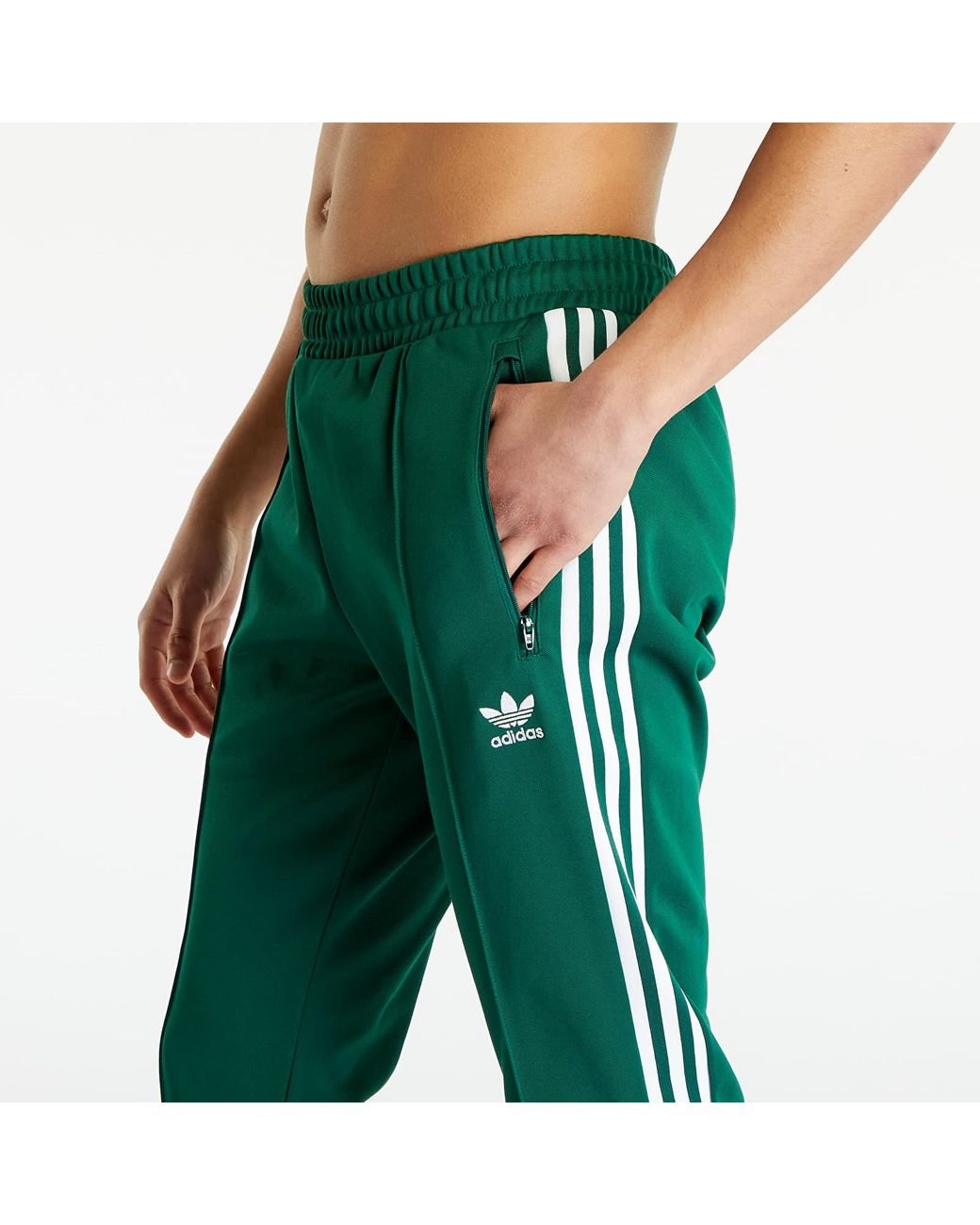 Army green adidas pants on sale