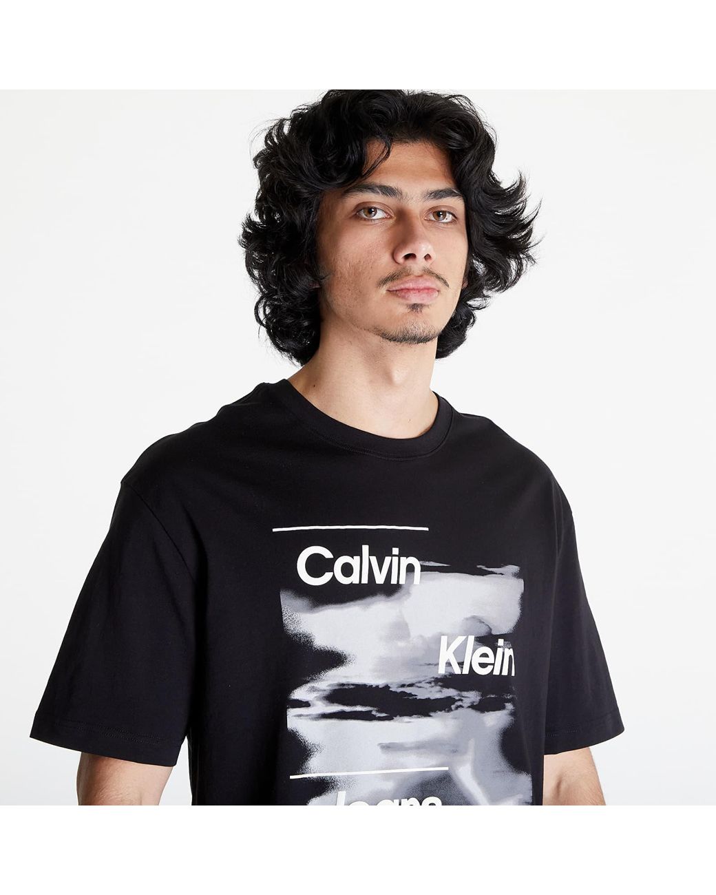 Calvin Klein Jeans t-shirt in black with sleeve institutional logo