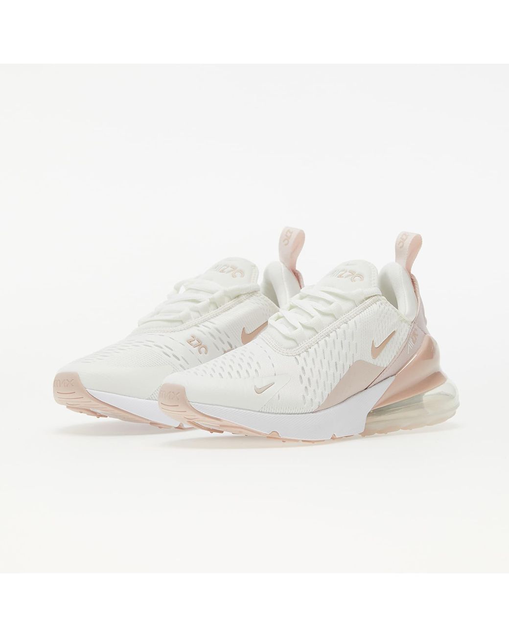 white and pink nike 270