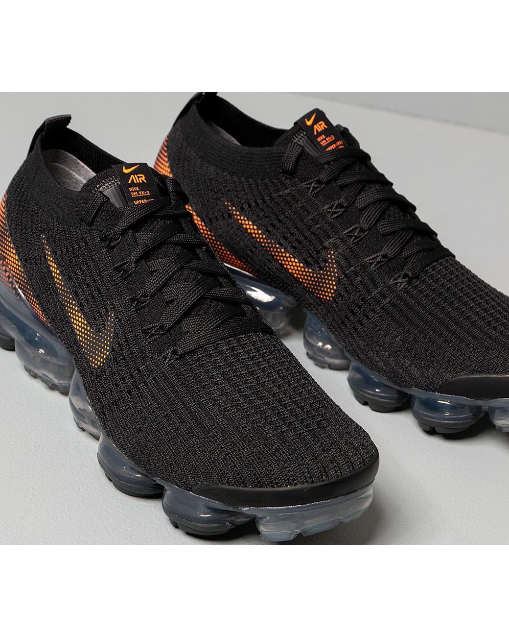 vapormax flyknit 3 grey and orange