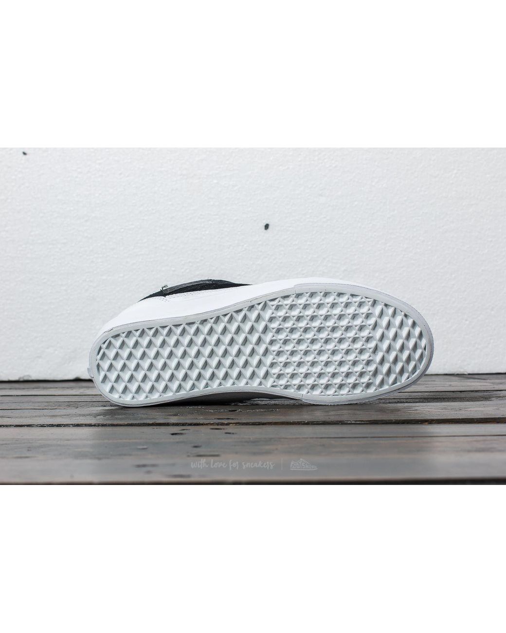 half black half white vans