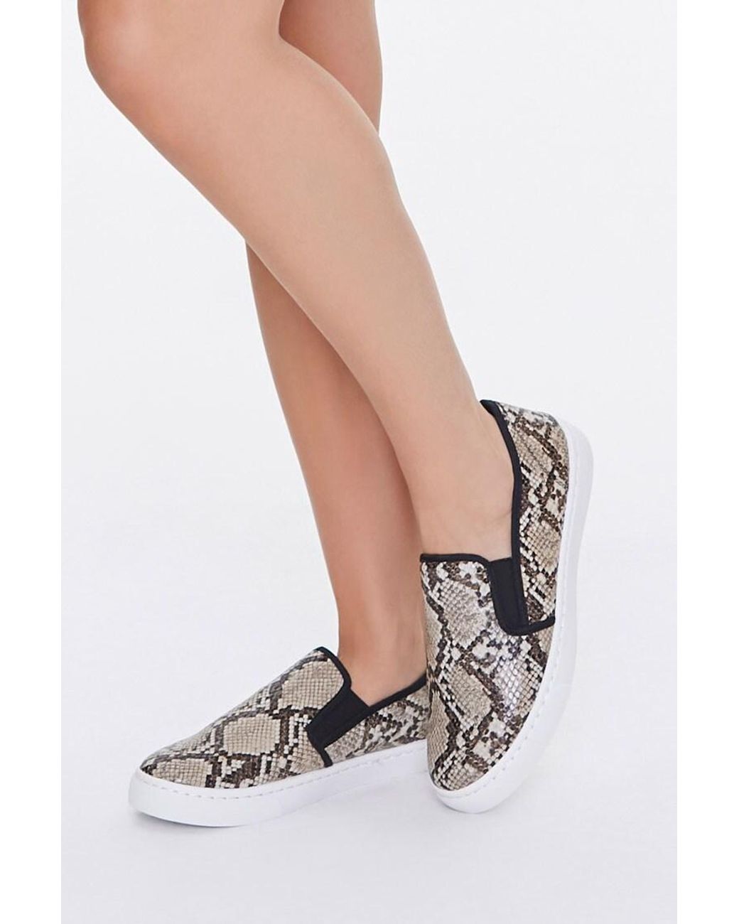 faux snakeskin slip on sneakers