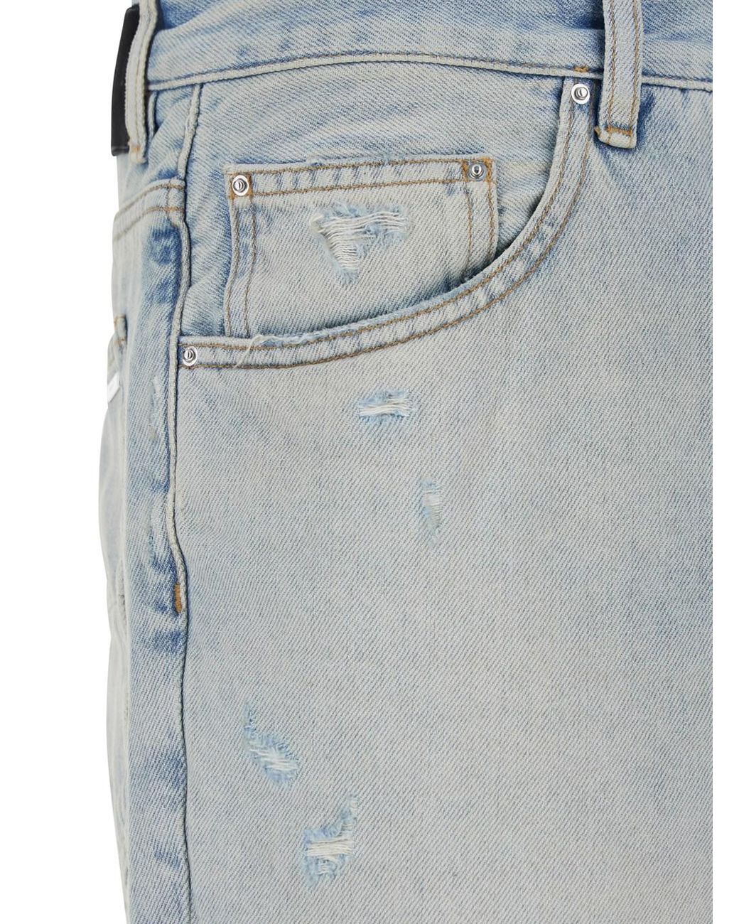 Amiri Blue Light Bliue Jeans With Flared Leg And Ripped Details for men