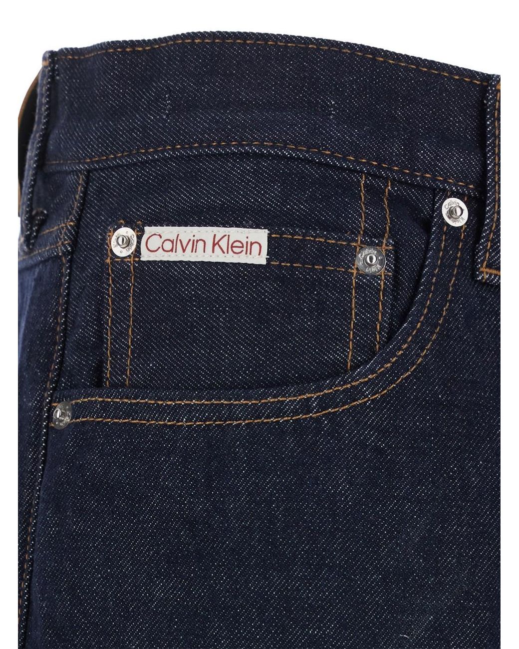 Calvin Klein Blue Denim Jeans With Logo Patch On Front & Back for men
