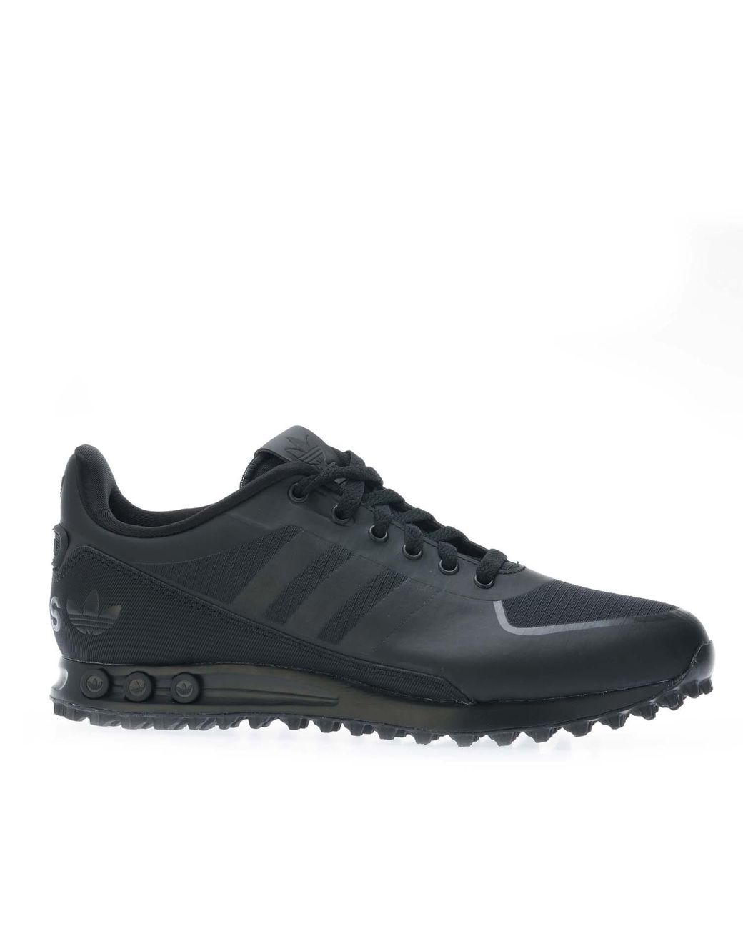 La trainer total black hot sale