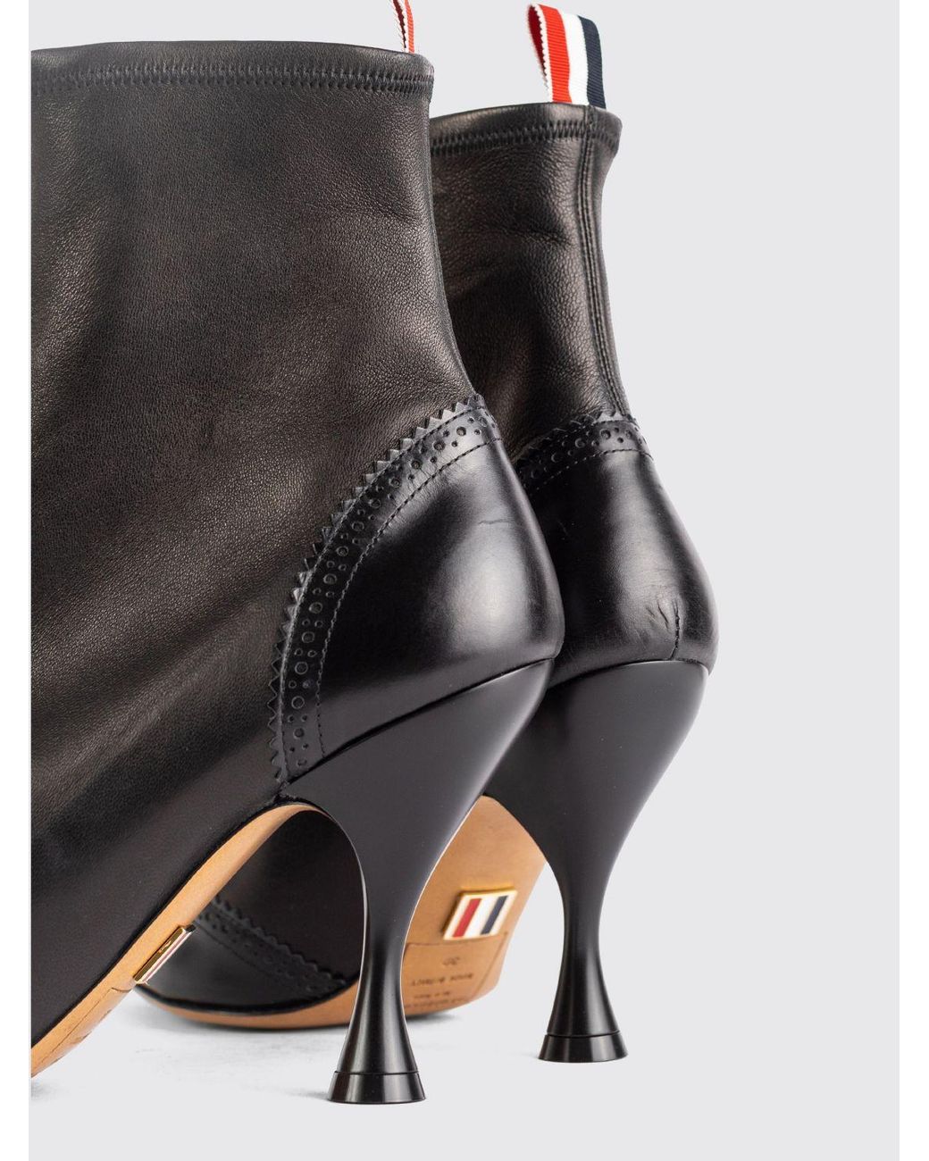 Thom Browne Black Wingtip Leather Ankle Boots With High Spool Heel And Rear Flag