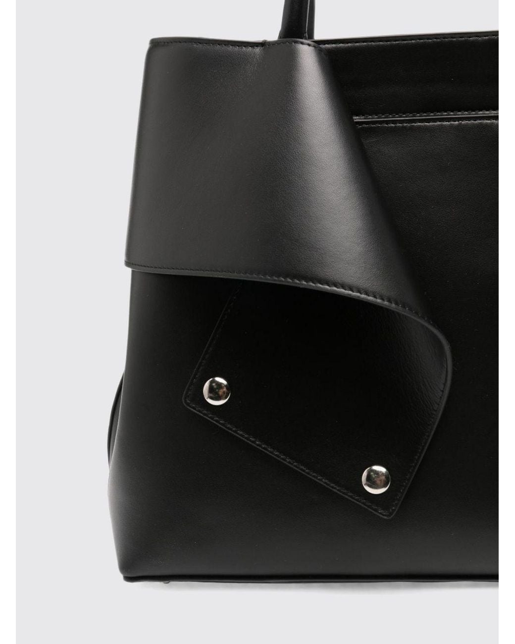 Totême  Black Mercer Mini Leather Handbag With Flared Design And Double Handles