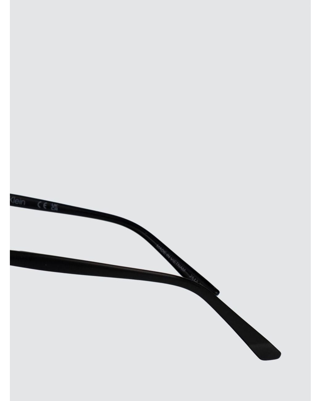 Calvin Klein Black Cat-Eye Acetate Sunglasses With Amber Lenses