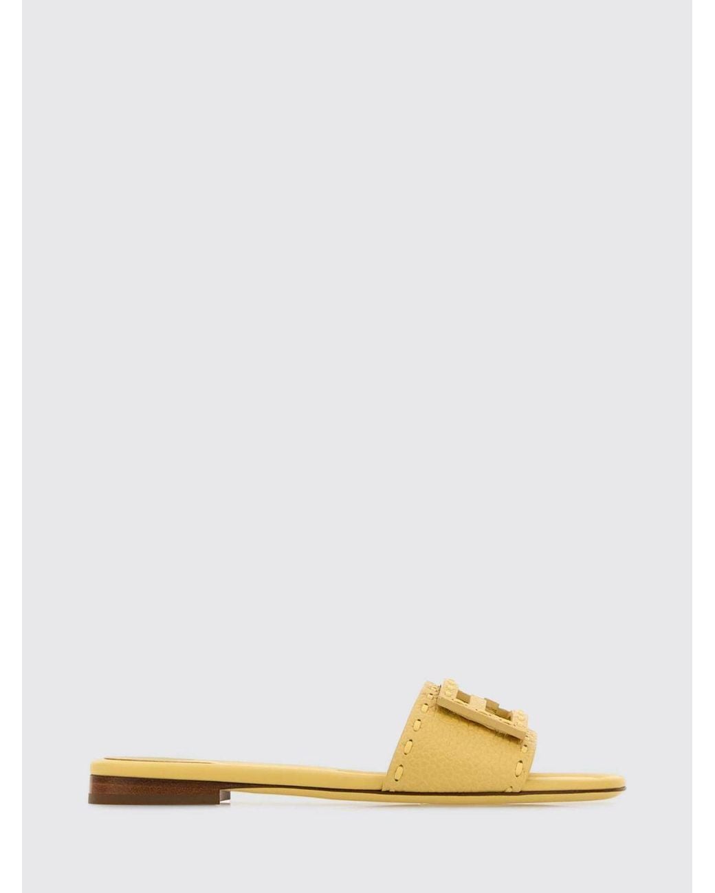 Fendi Yellow Baguette Grained Leather Mules With Hand Stitching