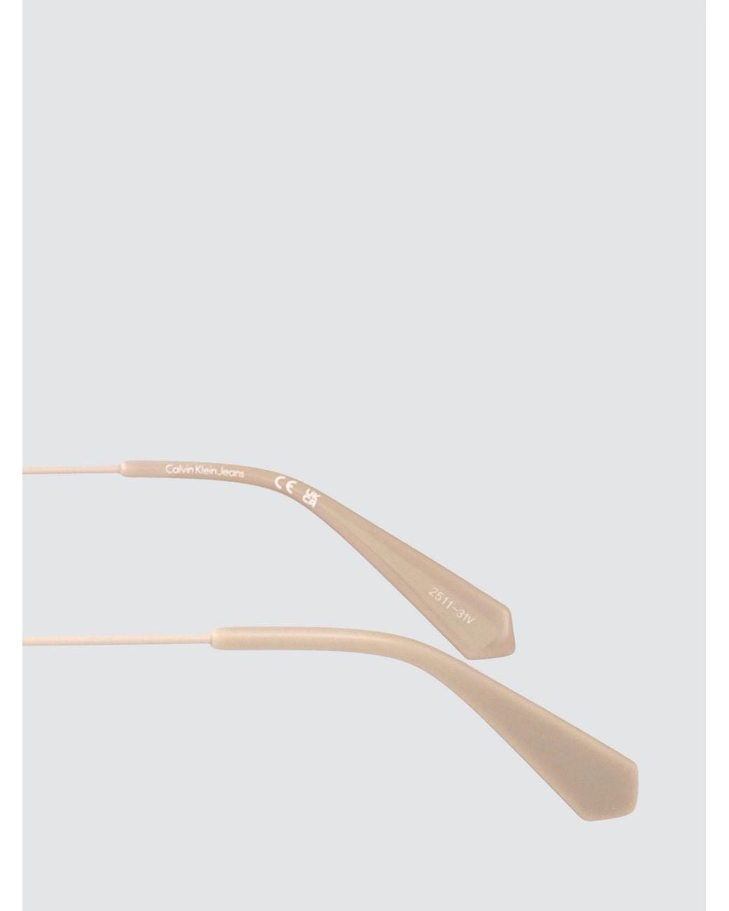 Calvin Klein Metallic Oval Metal Sunglasses With Engraved Logo for men