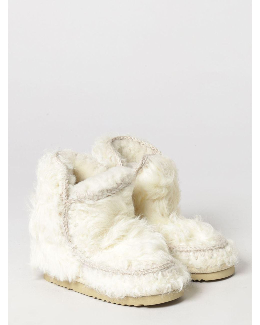 Mou White Eskimo Fur Ankle Boots With Exposed Stitching And Wool Lining