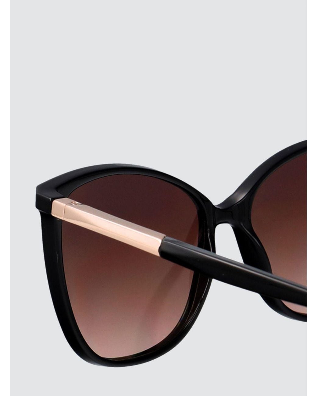 Calvin Klein Black Cat-Eye Acetate Sunglasses With Amber Lenses