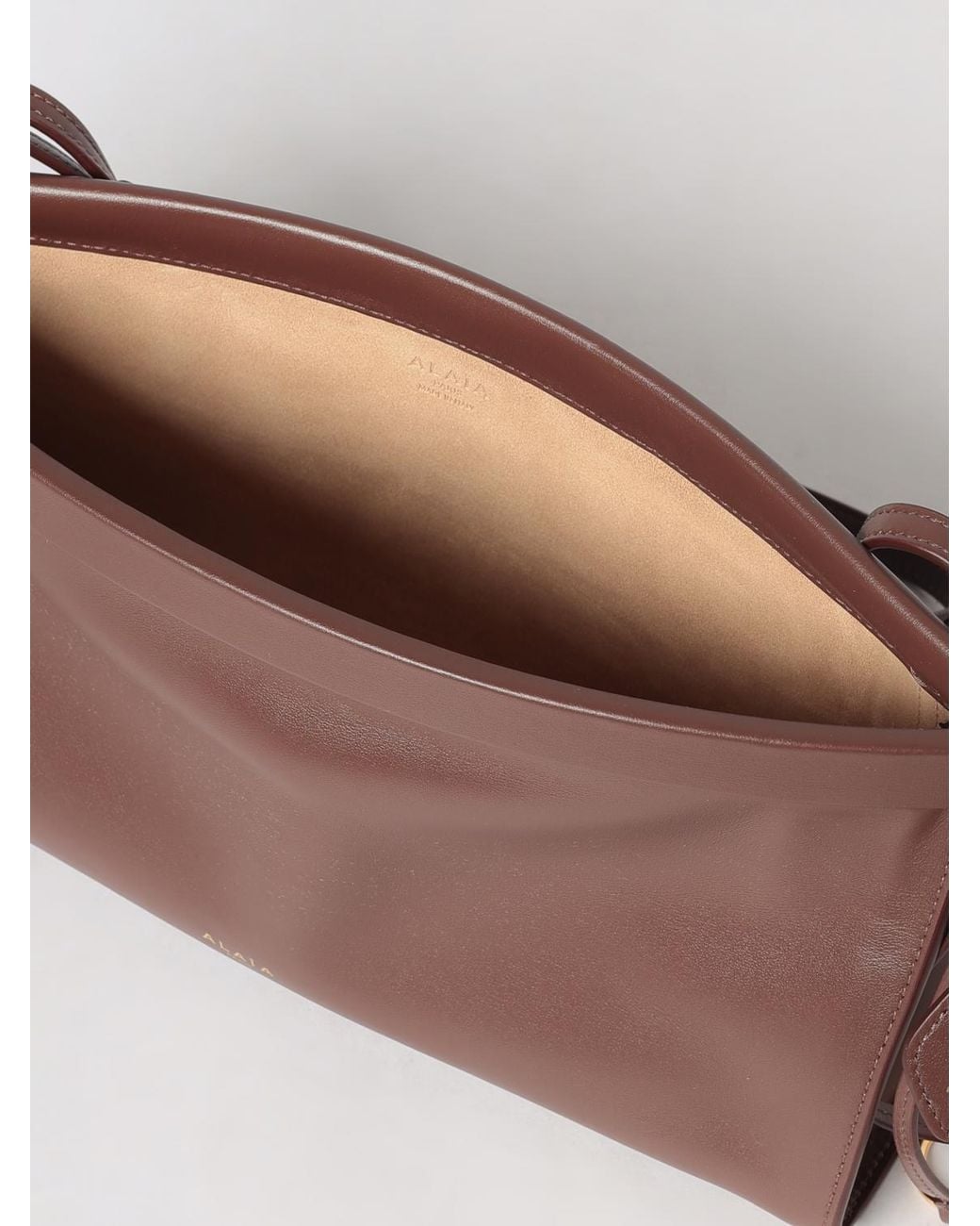 Alaïa Brown Le Click East West Smooth Leather Shoulder Bag With Tassels