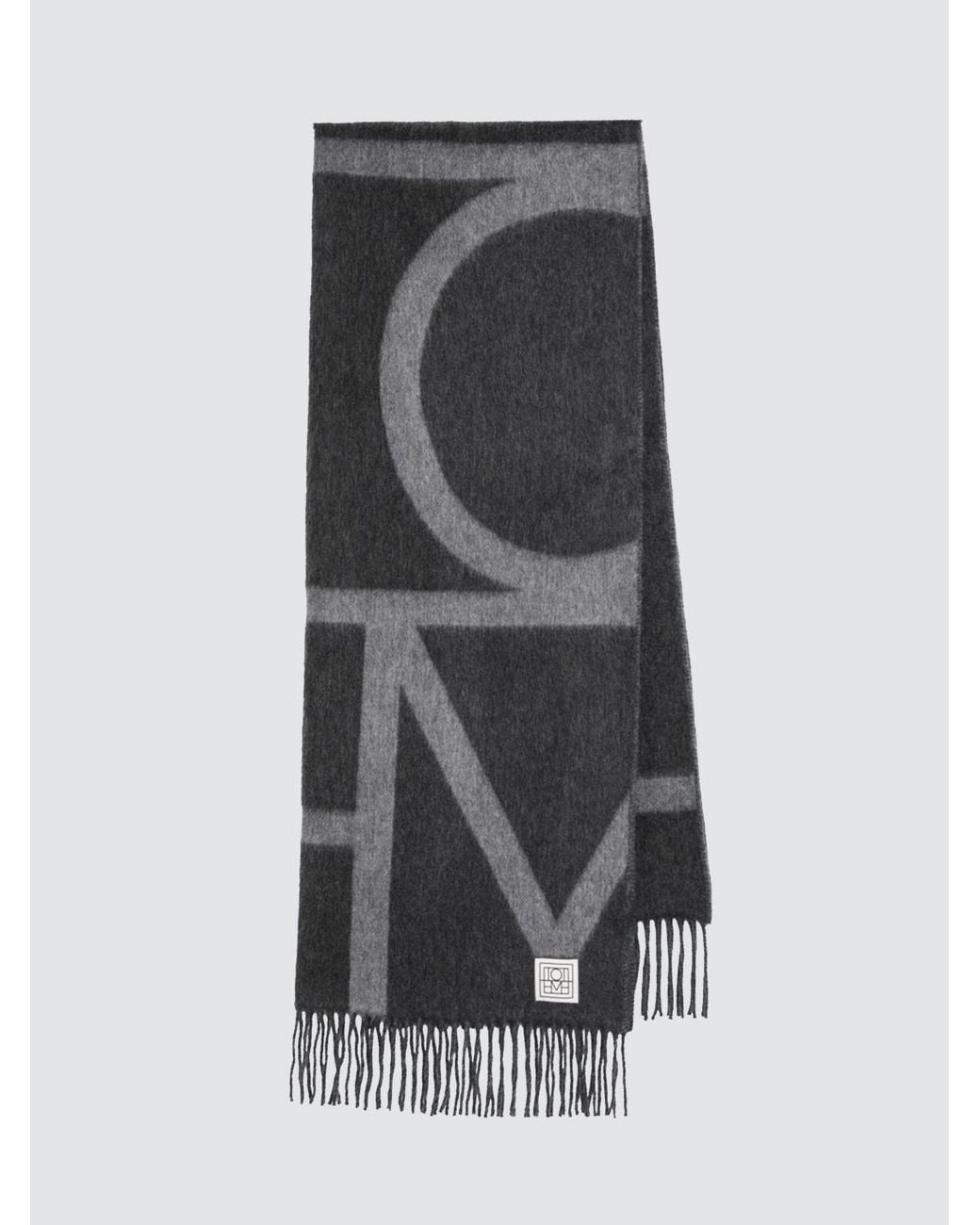 Totême  Black Virgin Wool Scarf With Contrasting Lettering Logo And Fringed Hem