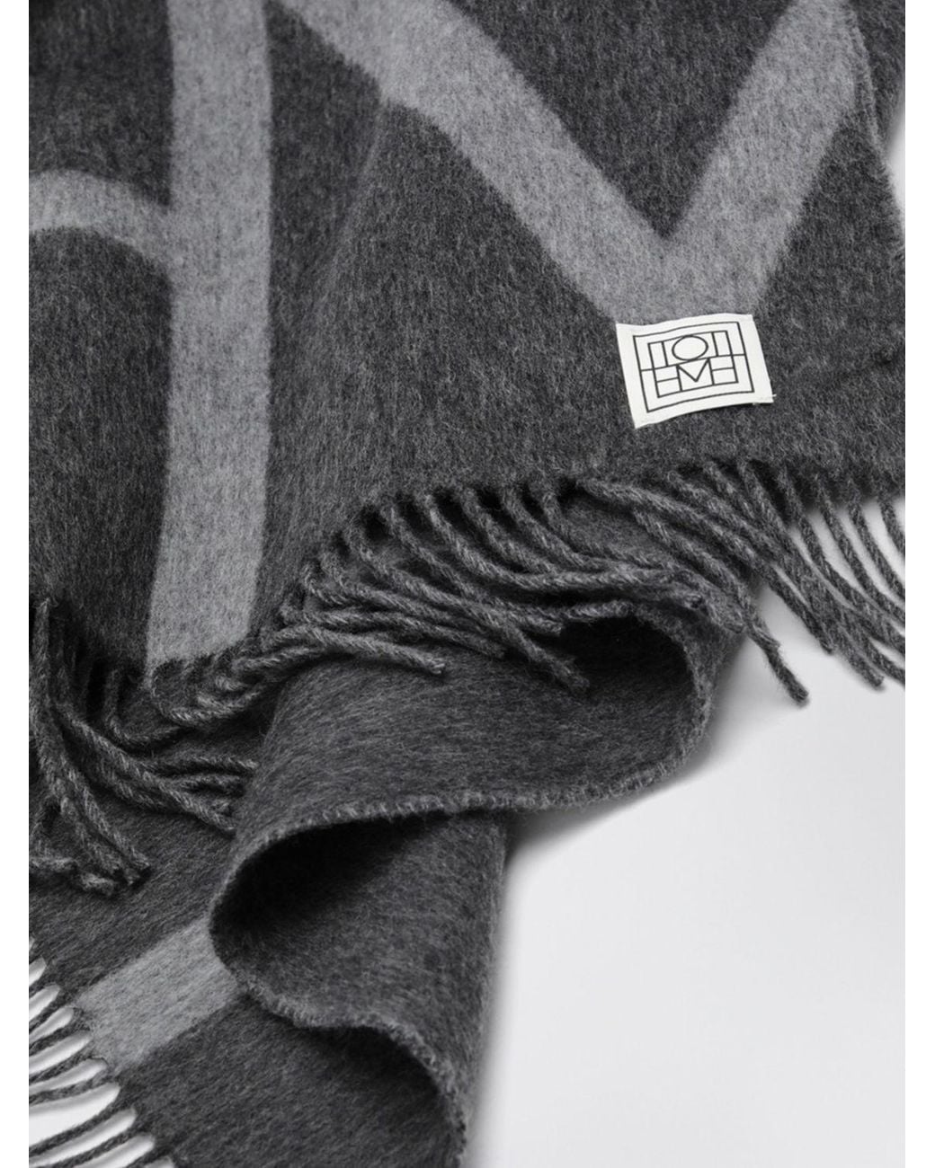 Totême  Black Virgin Wool Scarf With Contrasting Lettering Logo And Fringed Hem