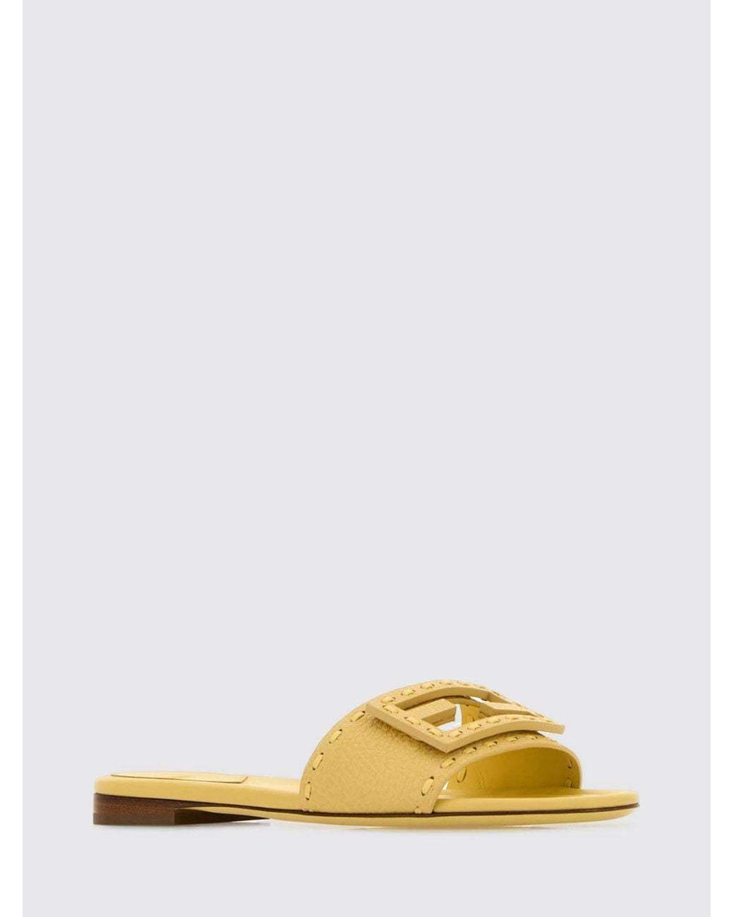 Fendi Yellow Baguette Grained Leather Mules With Hand Stitching