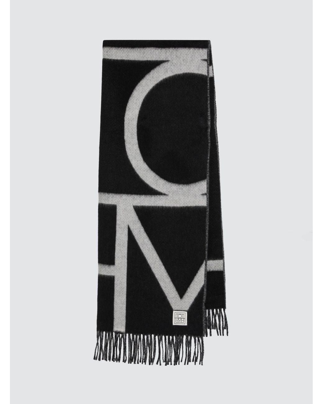 Totême  Black Virgin Wool Scarf With Contrasting Lettering Logo And Fringed Hem