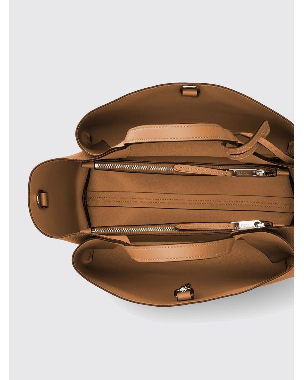 Tod's Brown Hammered Leather Handbag With Logo Charm And Removable Strap