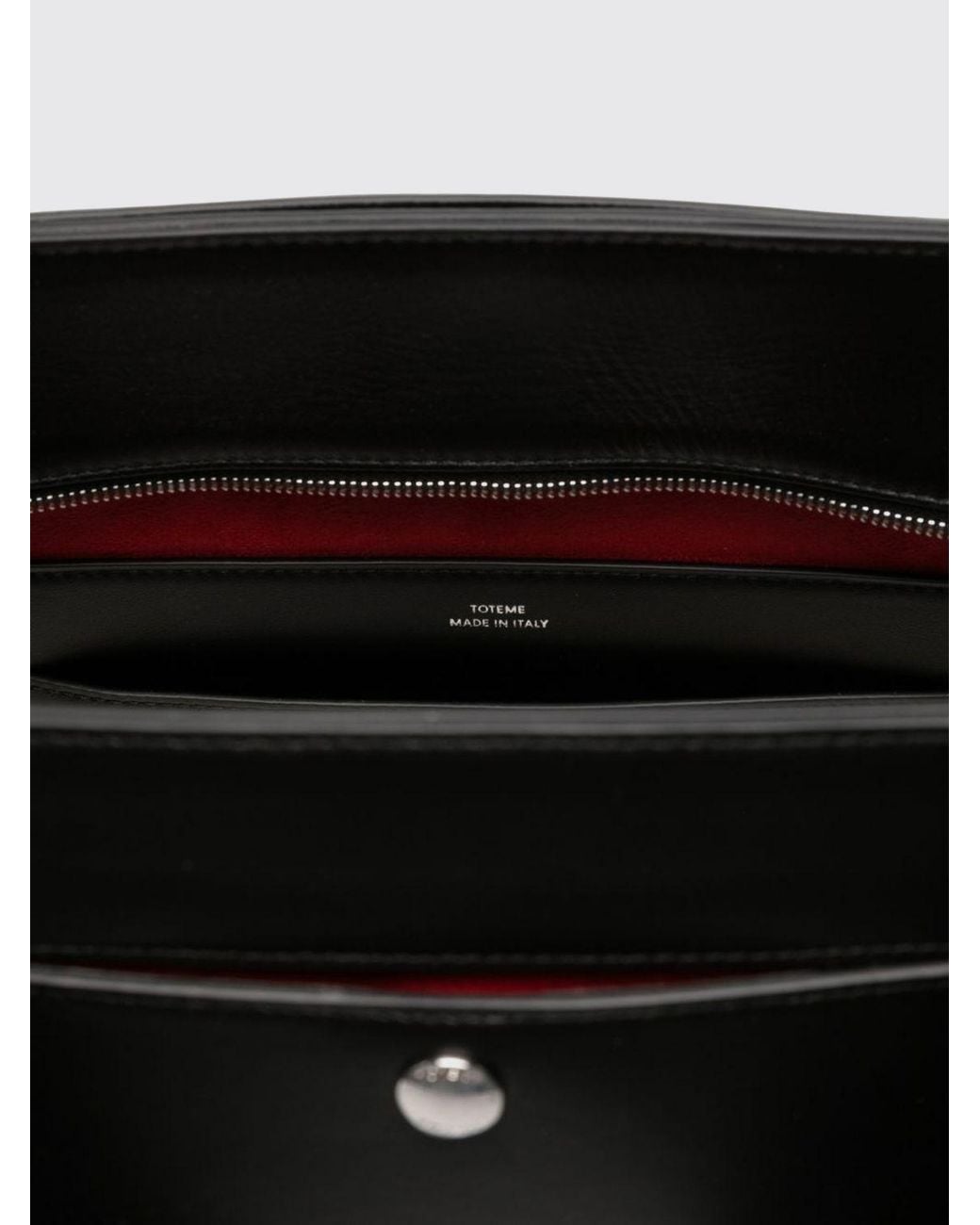 Totême  Black Mercer Mini Leather Handbag With Flared Design And Double Handles