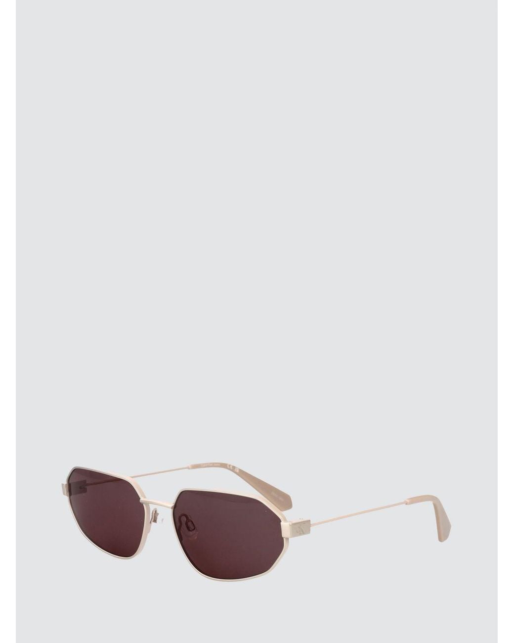 Calvin Klein Metallic Oval Metal Sunglasses With Engraved Logo for men