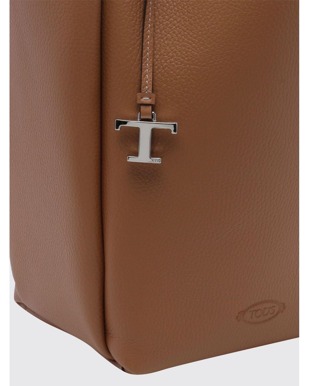 Tod's Brown Hammered Leather Bucket Bag With Double Handle And Charm