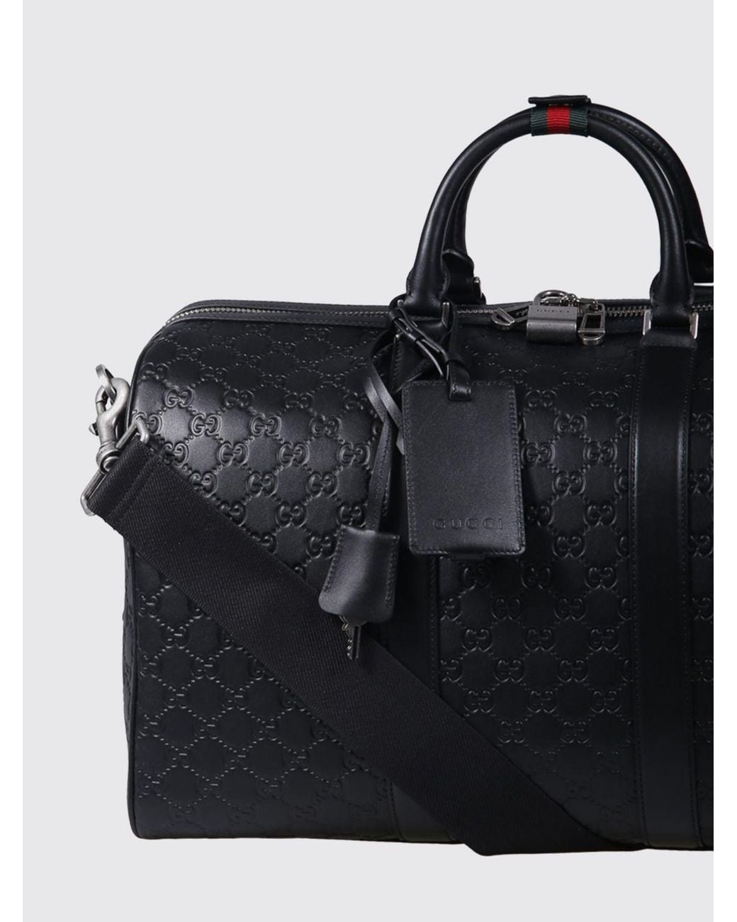 Gucci Black Gg Emblem Leather Duffle Bag With Embossed Gg Monogram for men