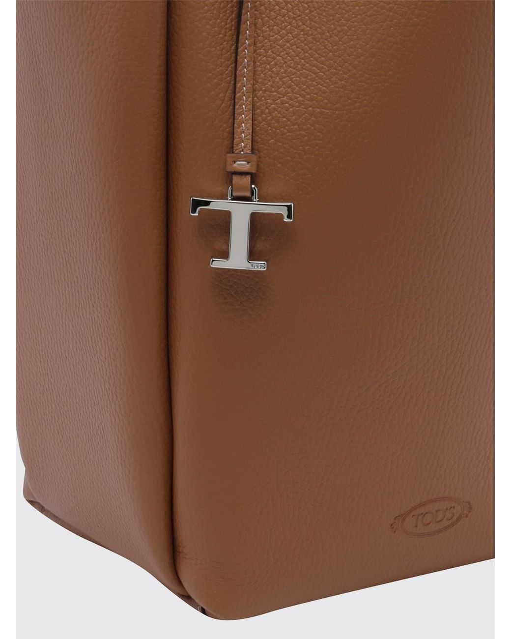 Tod's Brown Hammered Leather Bucket Bag With Double Handle And Charm