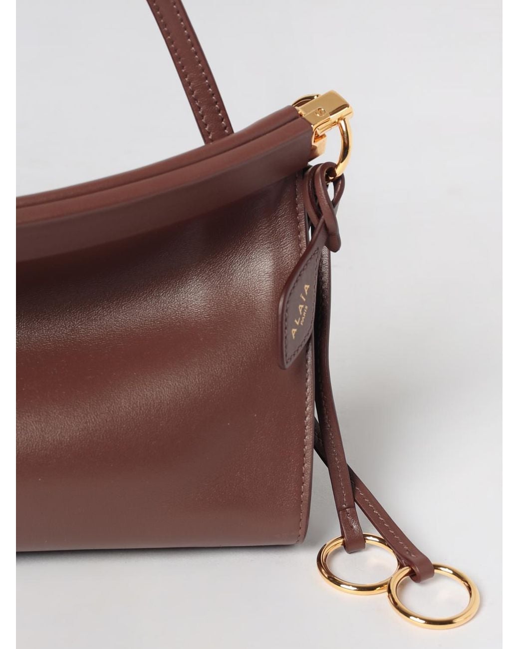 Alaïa Brown Le Click East West Smooth Leather Shoulder Bag With Tassels