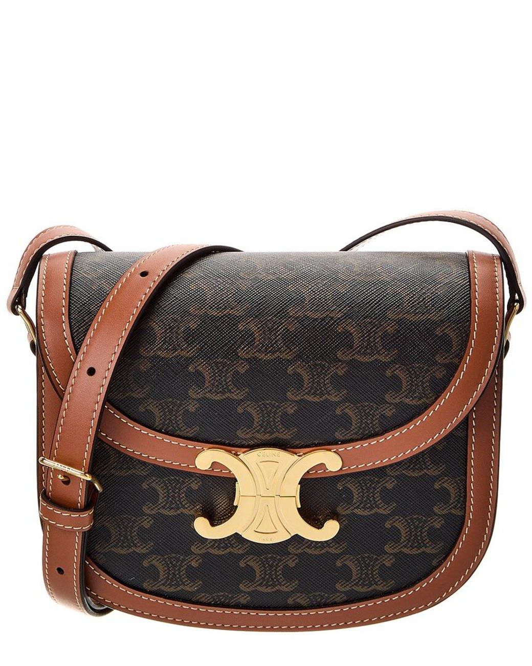 CLARA BAG 19 IN BLACK TRIOMPHE CANVAS AND BROWN CALFSKIN TRIM main image 1