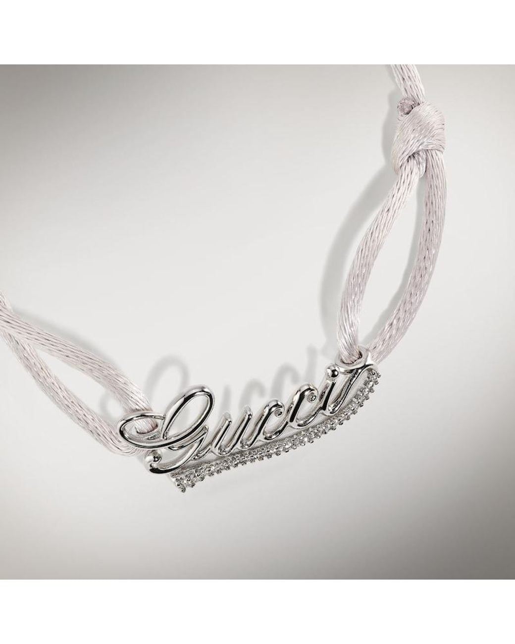 Gucci Metallic Script Cord Bracelet With Crystals