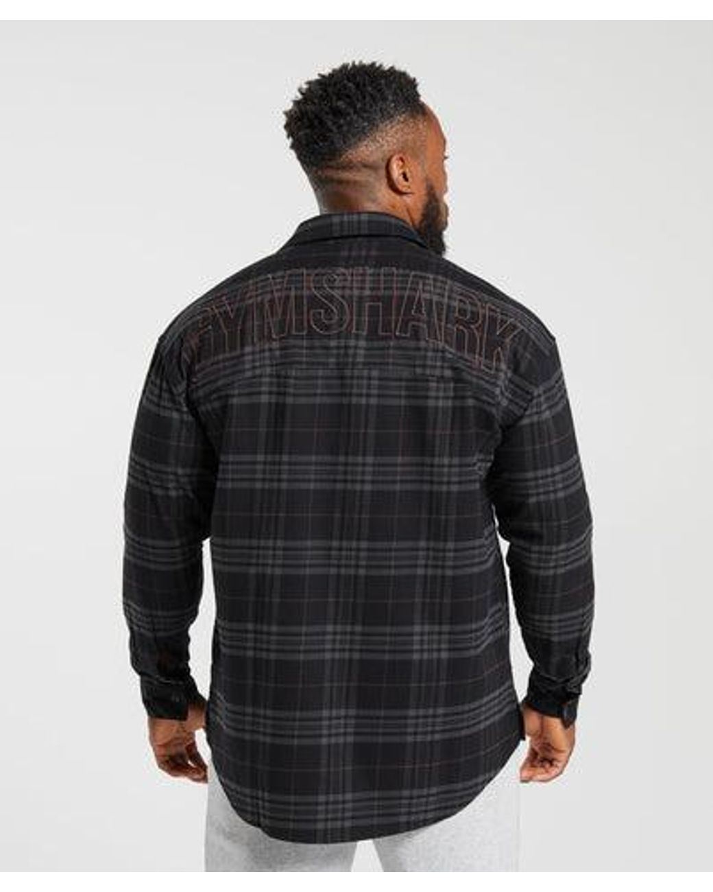 GYMSHARK Black Woven Wordmark Shirt for men