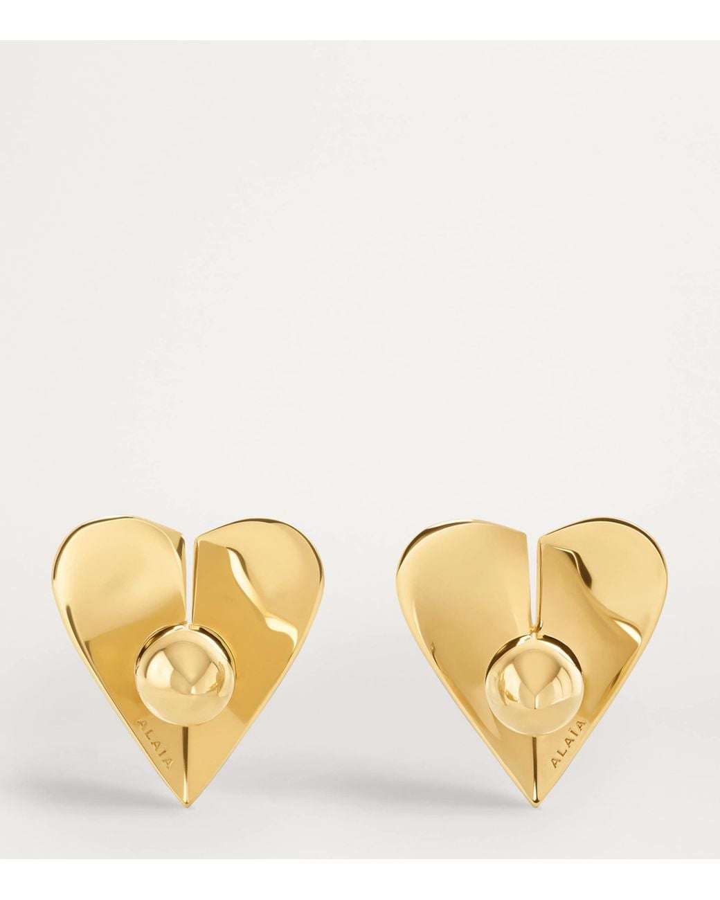 Alaïa Natural Brass Mini Le Coeur Earrings