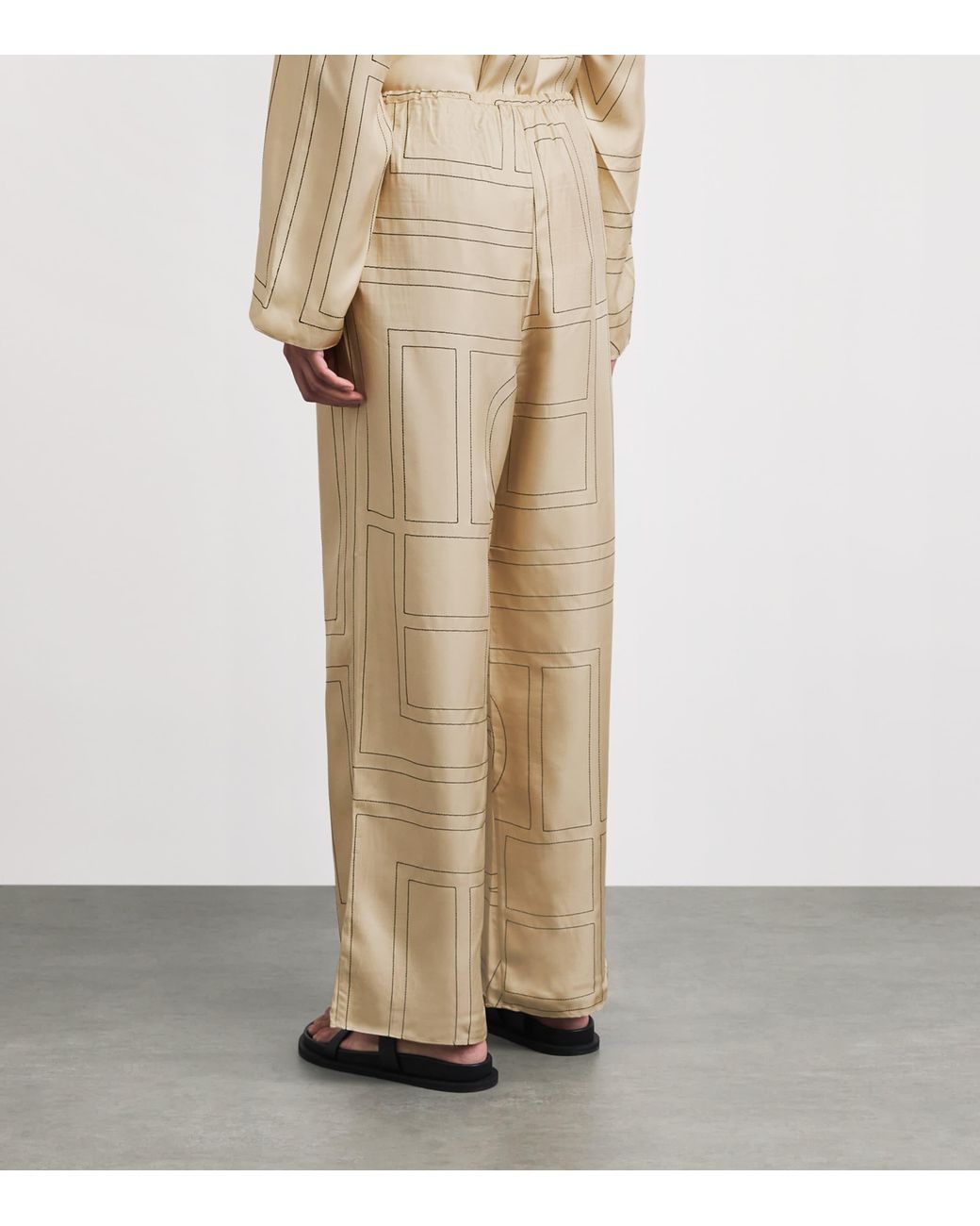 Totême Natural Silk Monogram Trousers