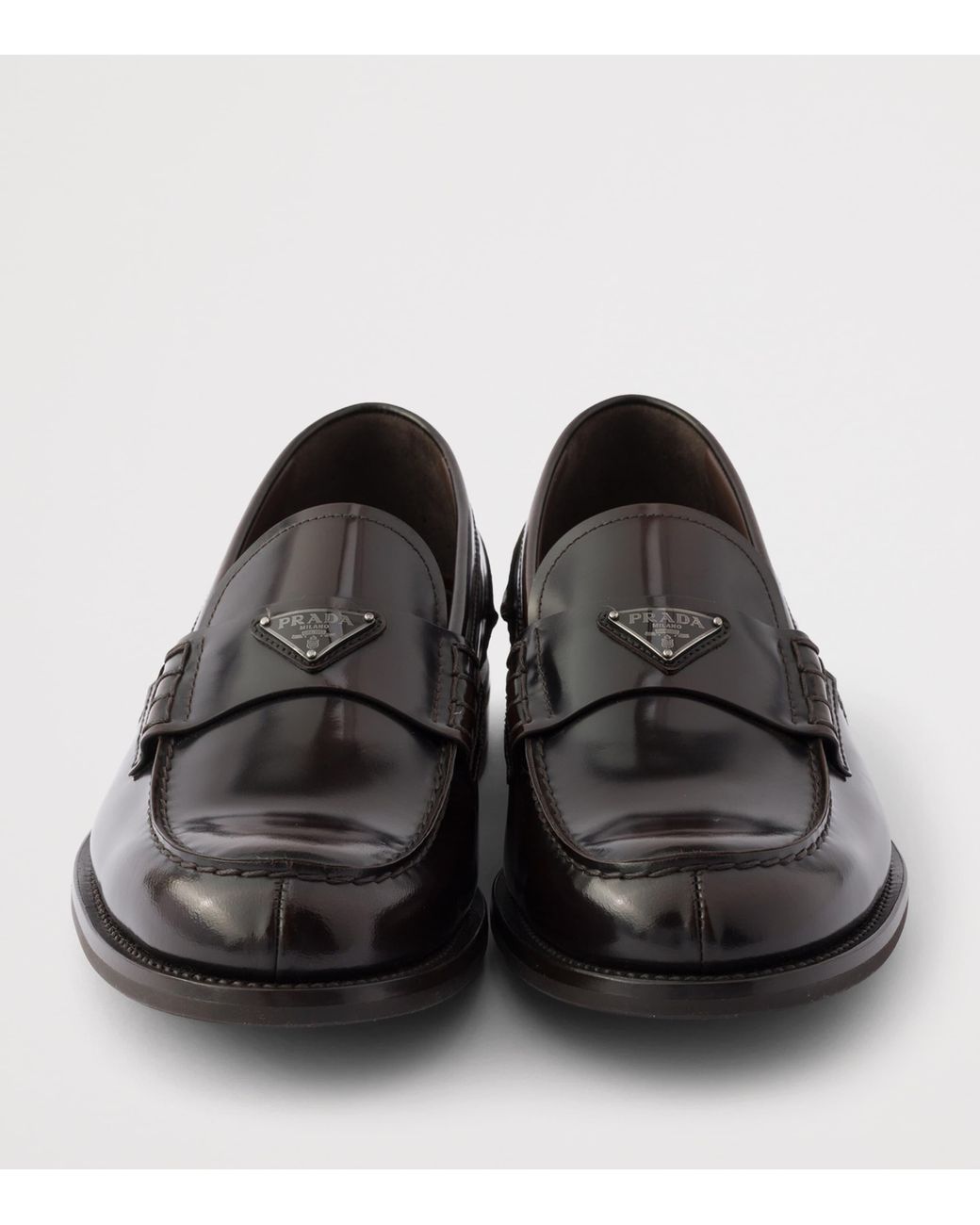Prada Black Brushed Leather Triangle Loafers for men
