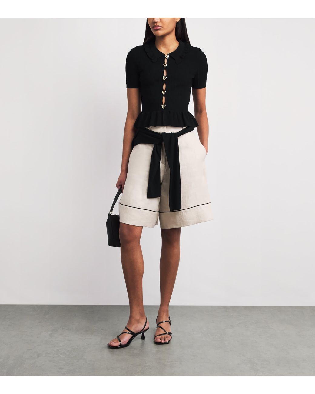 Claudie Pierlot Black Knitted Ribbed Peplum Sweater