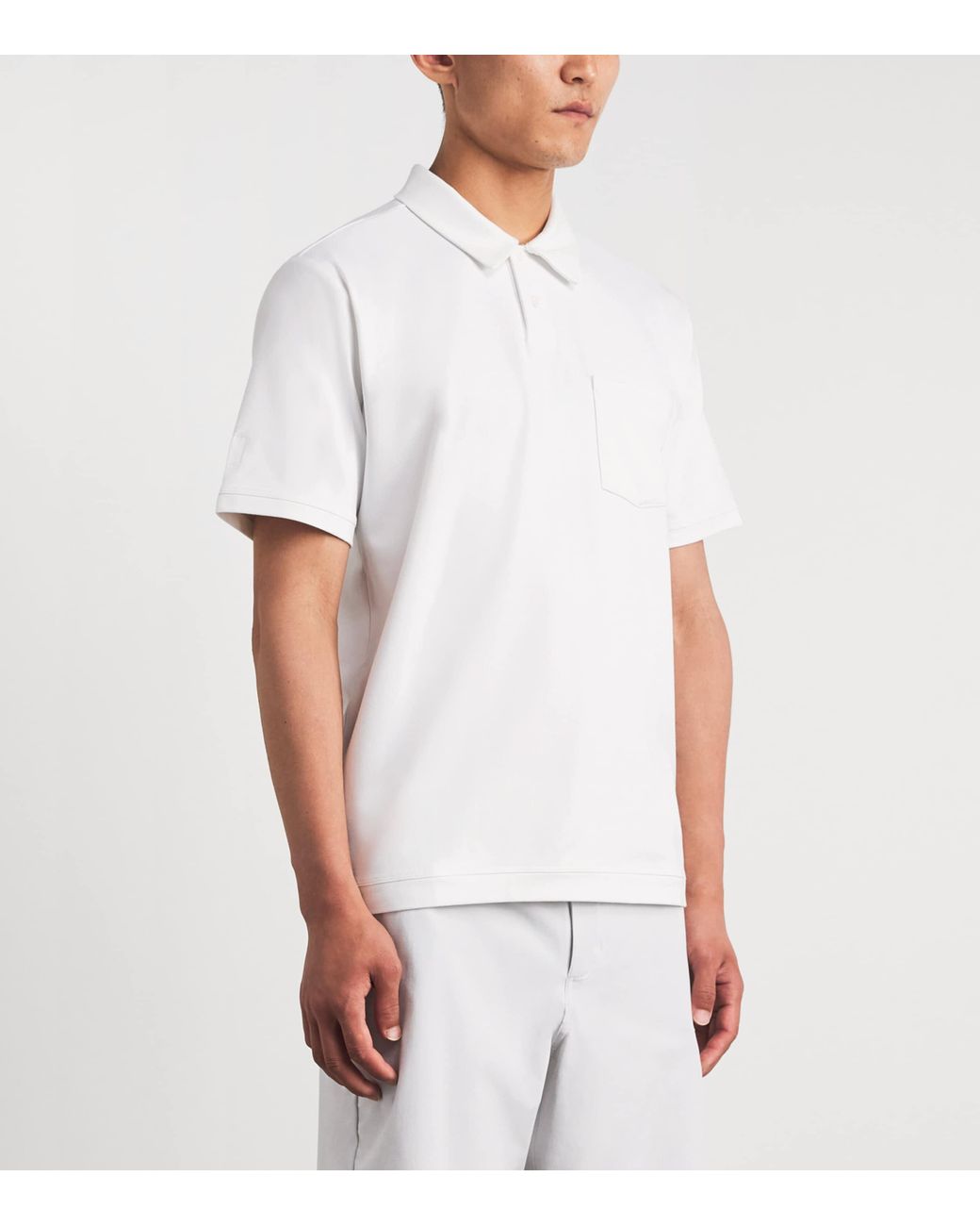vuori White Ponto Performance Polo Shirt for men